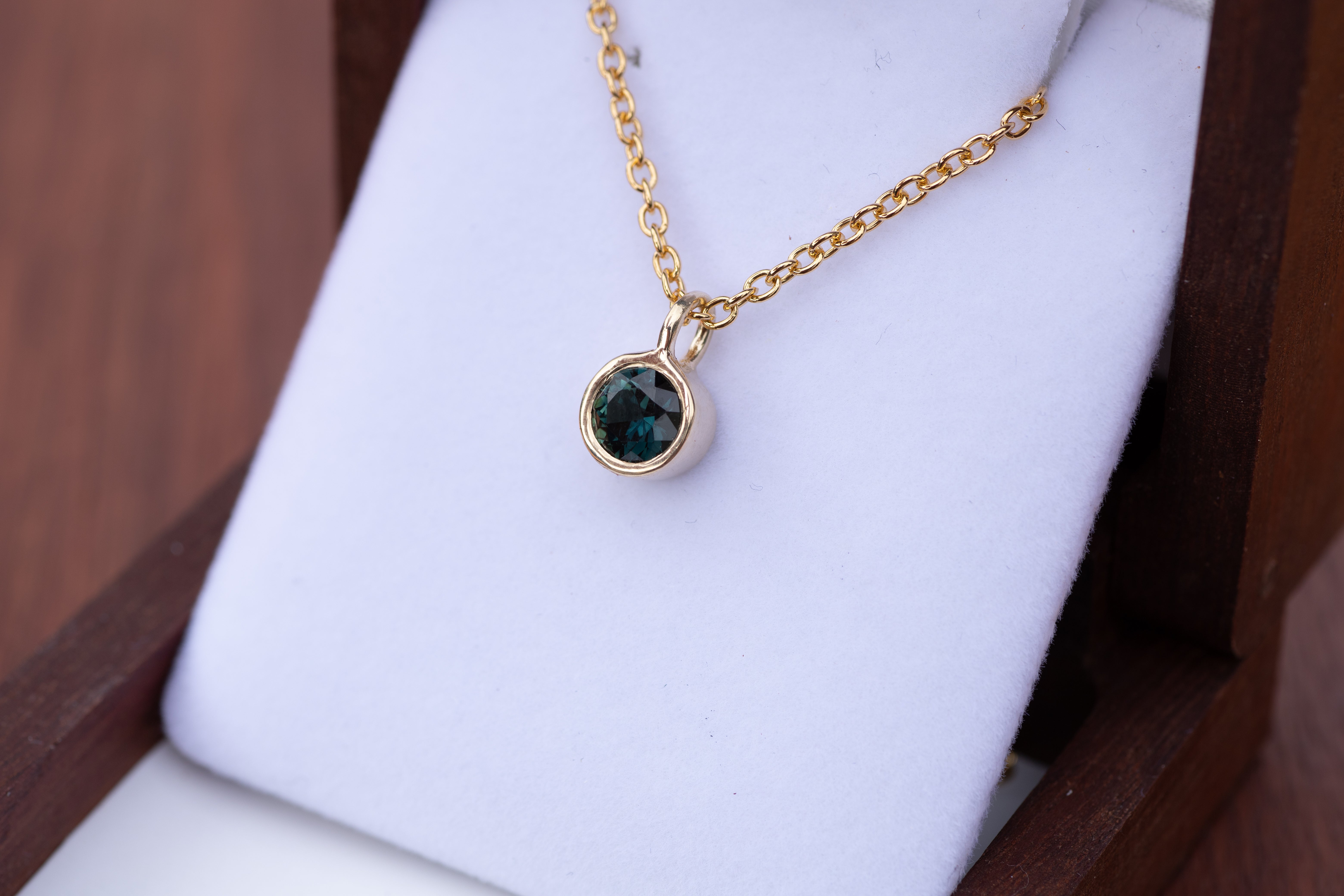 Teal sapphire pendant set in 9ct yellow gold & comes on 9ct yellow gold  chain — Lottie Jewellery