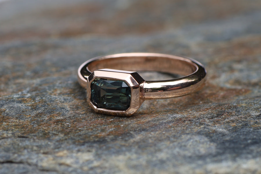 1.68ct Emerald cut colour change sapphire on 9ct rose gold.
