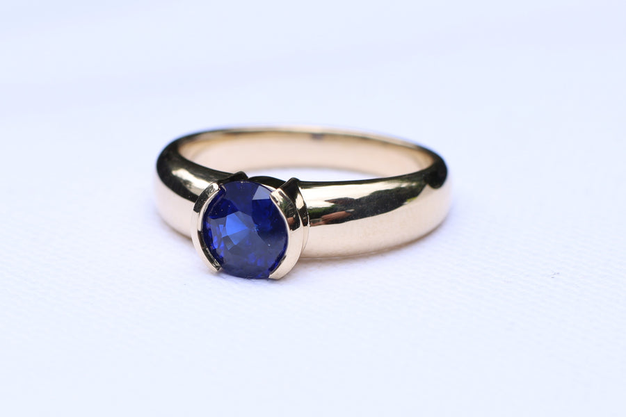 1.62ct Royal Blue Sapphire in Partial Bezel in 9ct yellow gold