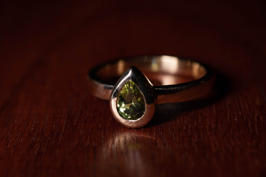 0.94ct Pear Yellow-Green Sapphire in a 9ct Yellow Gold Ring
