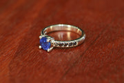 1.18ct Claw Set Royal Blue Sapphire with 0.30ct Black Diamonds in 9ct White Gold Ring