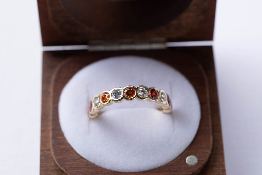 Orange Sapphire Ruby and Diamond Eternity Ring